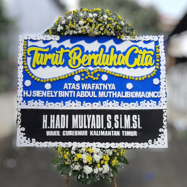 Karangan Bunga Duka Cita daanmogot